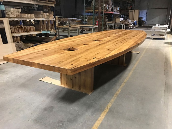Reclaimed White Oak Boat Shaped Conference Table on Factory Floor